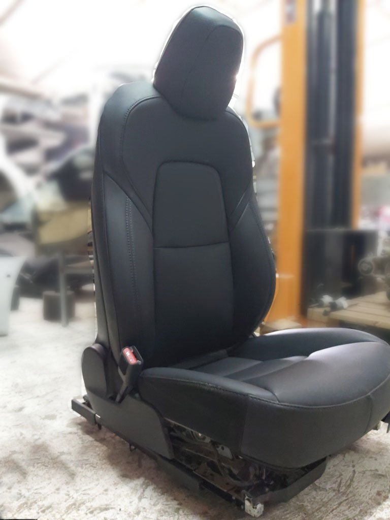 1 Driver's seat assembly with damage PRM PUR BLK Tesla model 3 7654322-01-C