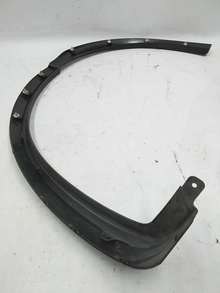 11 Fender cover rear left plastic Tesla model X 1035290-00-G