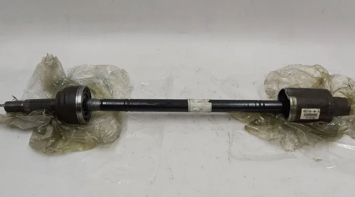 Піввісь передня права без пильовиків та хомутів AWD Tesla model X 1027115-00-D