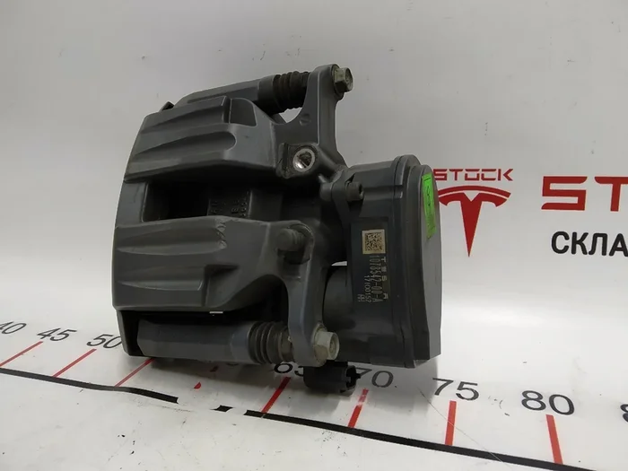 Суппорт тормозной задний правый MANDO (с тормозными колодками) Tesla model S REST, Tesla model X 1078542-00-B