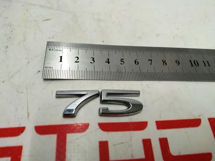 7 Emblém "75" Tesla model S REST, model X 1083137-00-B
